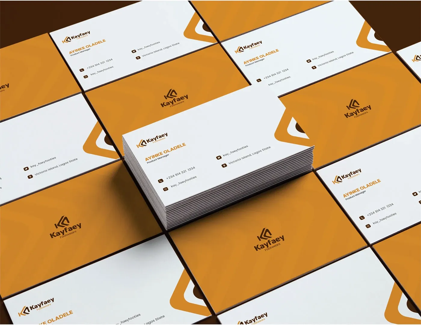 Business cards arranged in a grid, amber and white