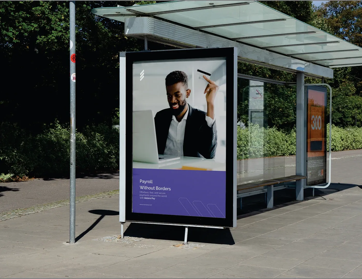 A bus shelter poster carrying the campaign photography